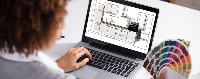 Female Architect Working On Color Selection For The Kitchen